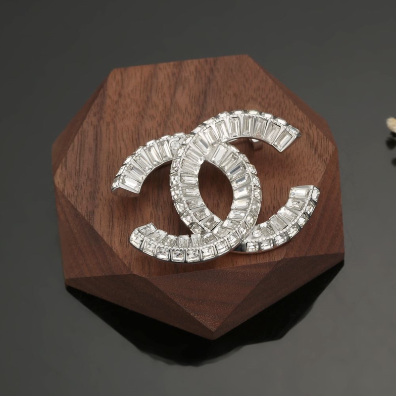 Ch**el brooches